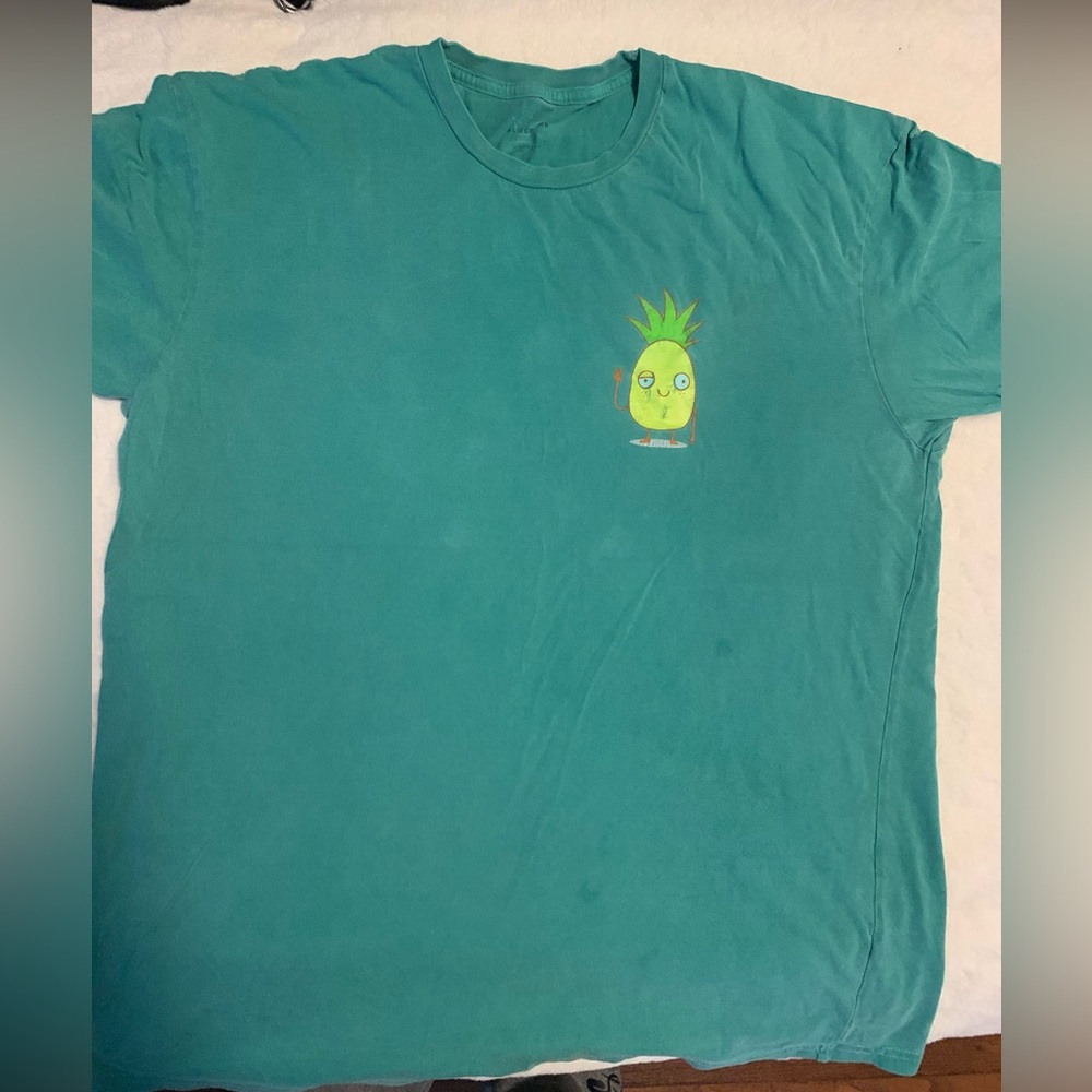 Green pineapple t-shirt. Much loved but no longer wear
